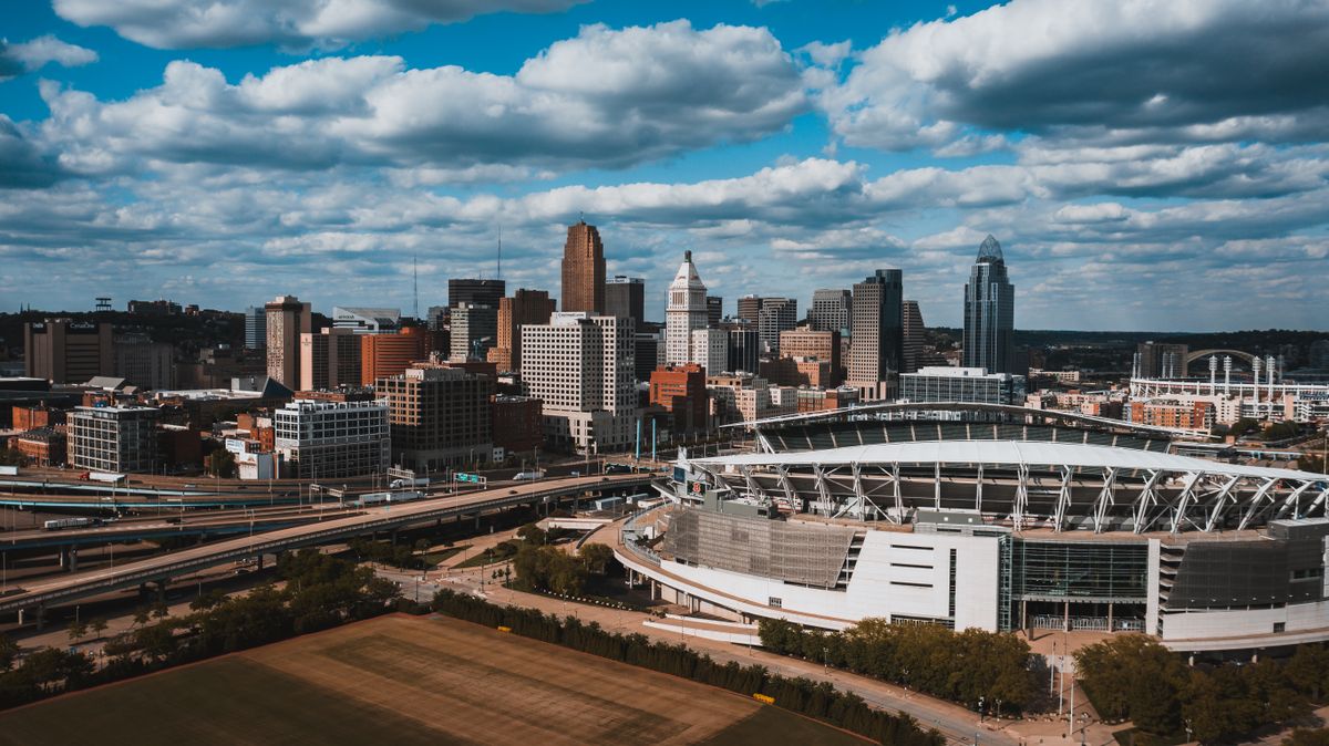 Aerial view of a stadium and its surrounding city skyline